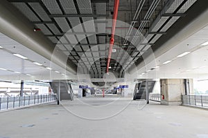 Pedestrian pathway or corridor or hallway between train station and airport building