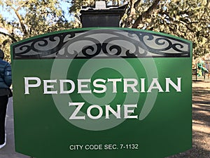 PEDESTRIAN ZONE - A warning for people not to ride their bicycles in the park.