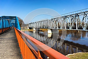 Pedestrian and railway bridges over the river