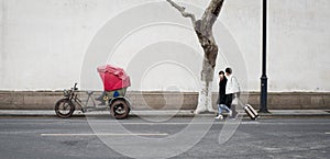 Pedestrian and Rickshaw at suzhou