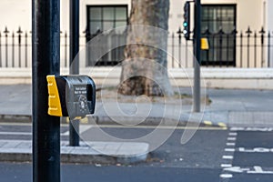 Pedestrian road crossing button