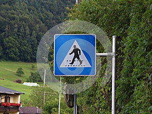 Pedestrian Sign of Man with Hat at Crossover