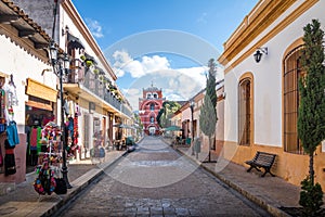 Pedestrian street and Del Carmen Arch Tower Arco Torre del Carmen - San Cristobal de las Casas, Chiapas, Mexico