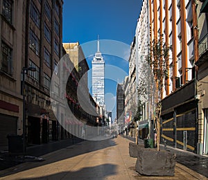 Pedestrian street in Downtown with Torre Latinoamericana on background - Mexico City, Mexico