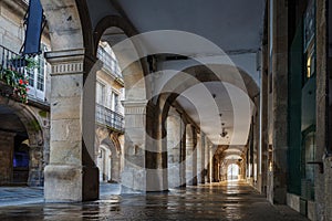 Pedestrian street and historic building facades in old town Santiago de Compostela, Galicia