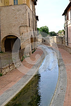 Pedestrian street of the portico dellee Conce in Foligno. Home to ancient tanneries along the canal of the mills