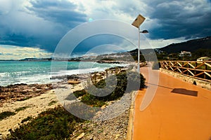 Pedestrian Stroll by the Mediterranean Sea