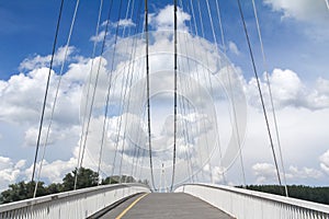 Pedestrian suspension bridge with a bicyle lane connecting the two sides of the Drava river in Osijek, Croatia