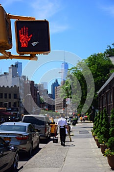 Pedestrian Traffic Light Stoplight in Downtown New York Signaling No Crossing photo