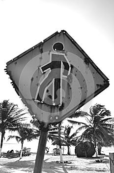 Pedestrian traffic sign with bullet holes