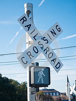 Pedestrian transit train crossing with warning lights