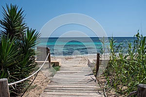 Pedestrian walkway on Migjorn beach in Formentera in Spain in Times of COvid 19