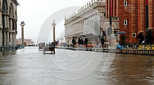 Pedestrian walkway in Venice in Italy during flood