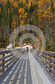 Pedestrian wooden bridge that leads to Riverain Path