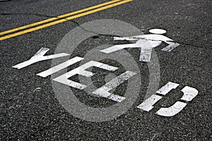 Pedestrian yield sign on a road