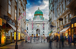 The pedestrian zone Herrengasse with a view towards imperial Hofburg palace in Vienna, Austria.