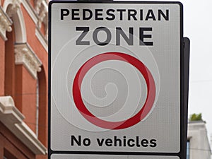 pedestrian zone no vehicles sign