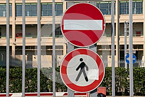 Pedestrians prohibited from passing with road signs, prohibition sign and pedestrian crossing obligation sign. in pedestrian areas