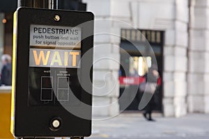 Pedestrians wait