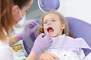 Pediatric dentist with patient