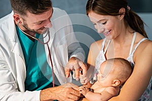 Pediatric doctor exams little baby. Health care, medical examination, people concept