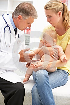 Pediatrician with baby