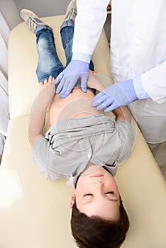 Pediatrician doctor examining child