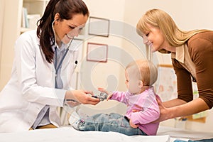 Pediatrician examine baby with stethoscope