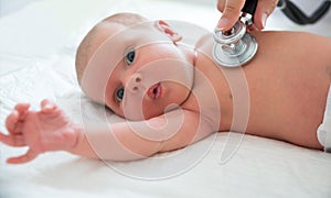 Pediatrician Examining Baby