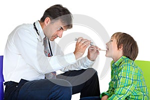 Pediatrician examining boy