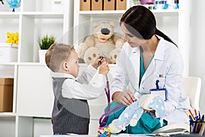 Pediatrician with patient photo