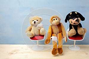 Pediatrician. Toy animals sitting on the chair in hospital. Health center for children.