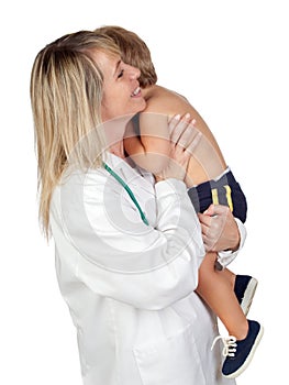 Pediatrician woman with a scared baby