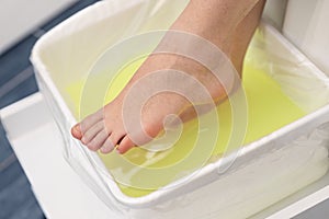 Pedicure feet bath in spa salon