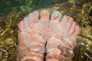 Pedicure nail colored in Mediterranean sea water