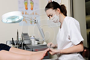 Pedicure procedure in the beauty salon