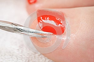Pedicure process macro closeup