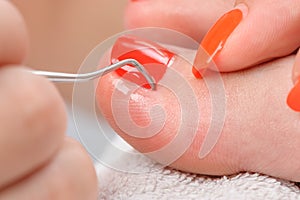 Pedicure process macro closeup