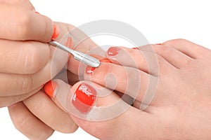 Pedicure process macro closeup