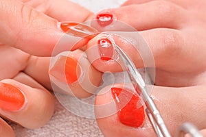 Pedicure process macro closeup