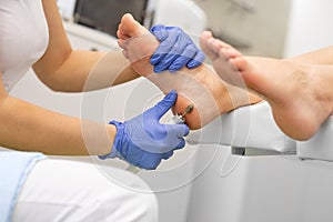 Pedicure removes thick skin on the heel