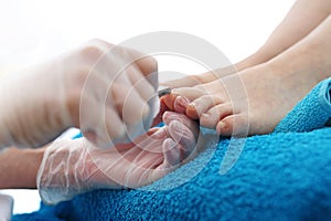 Pedicure. Woman during a pedicure at the beauty salon.