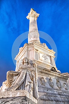 Pedro IV Obelisk at sunset in Rossio Square, Lisbon