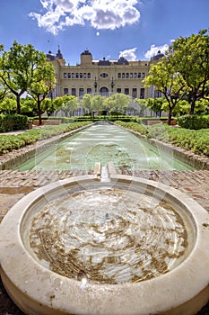 Pedro Luis Alonso gardens and the Town Hall building in Malaga, photo