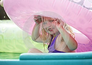 Peek-a-boo in the Kiddie pool fun