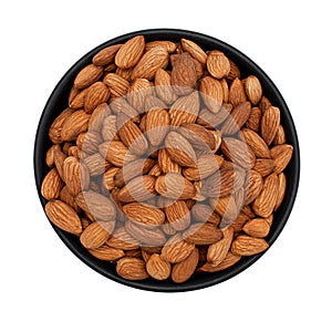 Peeled almonds in a bowl, isolated on white, top view.