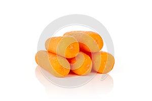 Peeled baby carrot isolated on white