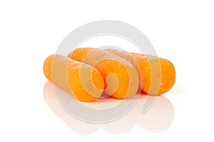 Peeled baby carrot isolated on white