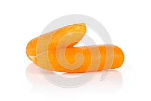 Peeled baby carrot isolated on white