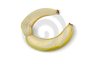 One side peeled banana isolated on white background